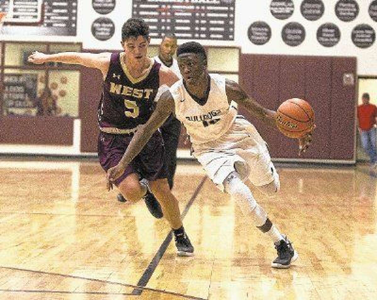 Magnolia guard Michael Woods (15) and the Bulldogs will be looking for big win against first-place Brenham tonight.