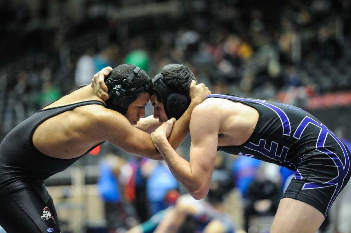 Willis’ Carson Dyer competes in the UIL state wrestling meet.