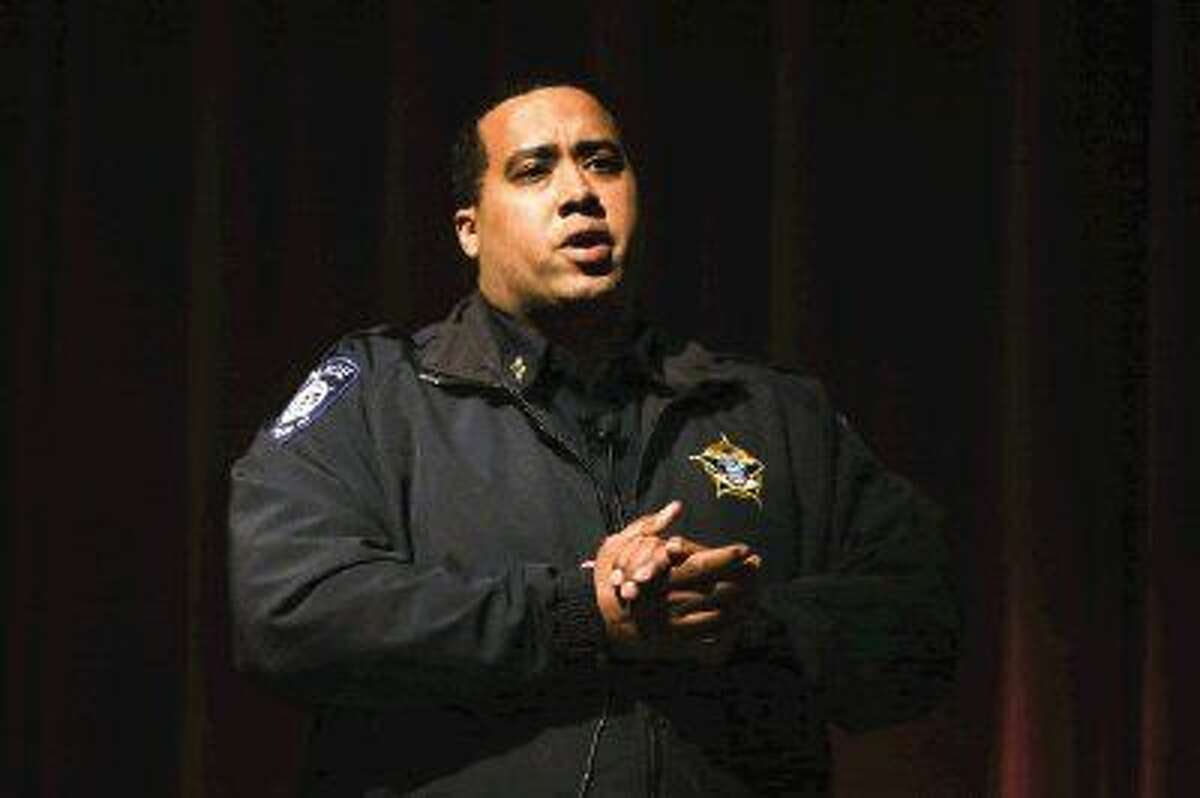 Montgomery ISD Police Chief Brandon Torres speaks Monday during the parent meeting about drug use at Montgomery schools.