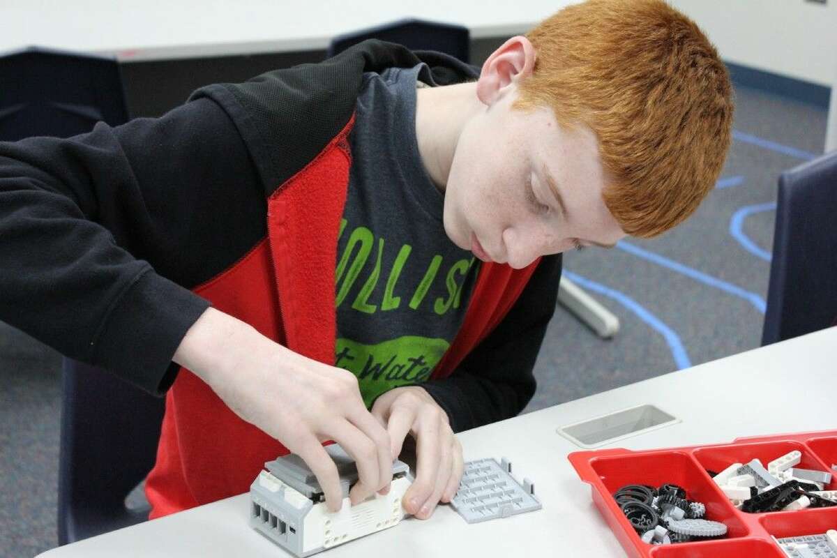 Brabham Middle School teacher Jason Merik started a robotics class this year where students are introduced to the principles of engineering and design and connect what they learn in math and science with new technology skills.