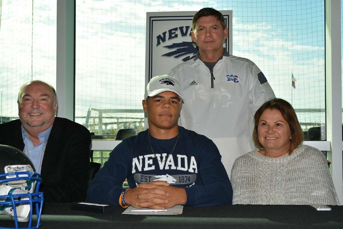 New Caney’s David Harvey signed with Nevada for football on Wednesday.