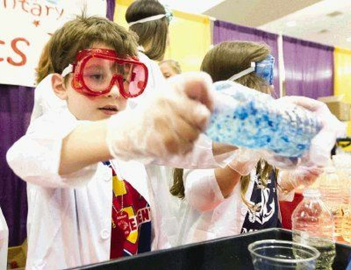 Hailey Elementary School students helped visitors make lava lamps during the annual SCI://TECH Expo at the Lone Star Convention and Expo Center Saturday. To purchase this photos, and others like it; go to HCNpics.com.