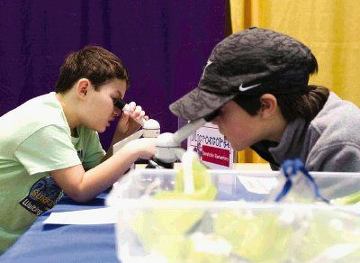 Thousand of students take part in experiments by area elementary schools during the annual SCI://TECH Expo at the Lone Star Convention and Expo Center Saturday. To purchase this photos, and others like it; go to HCNpics.com.