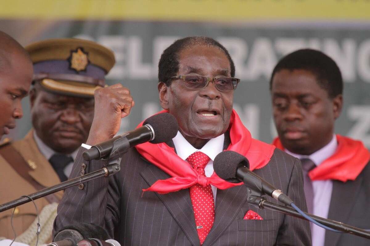 Zimbabwe President Robert Mugabe chants the party slogan during celebrations to mark his 91st birthday Saturday in the resort town of Victoria Falls.
