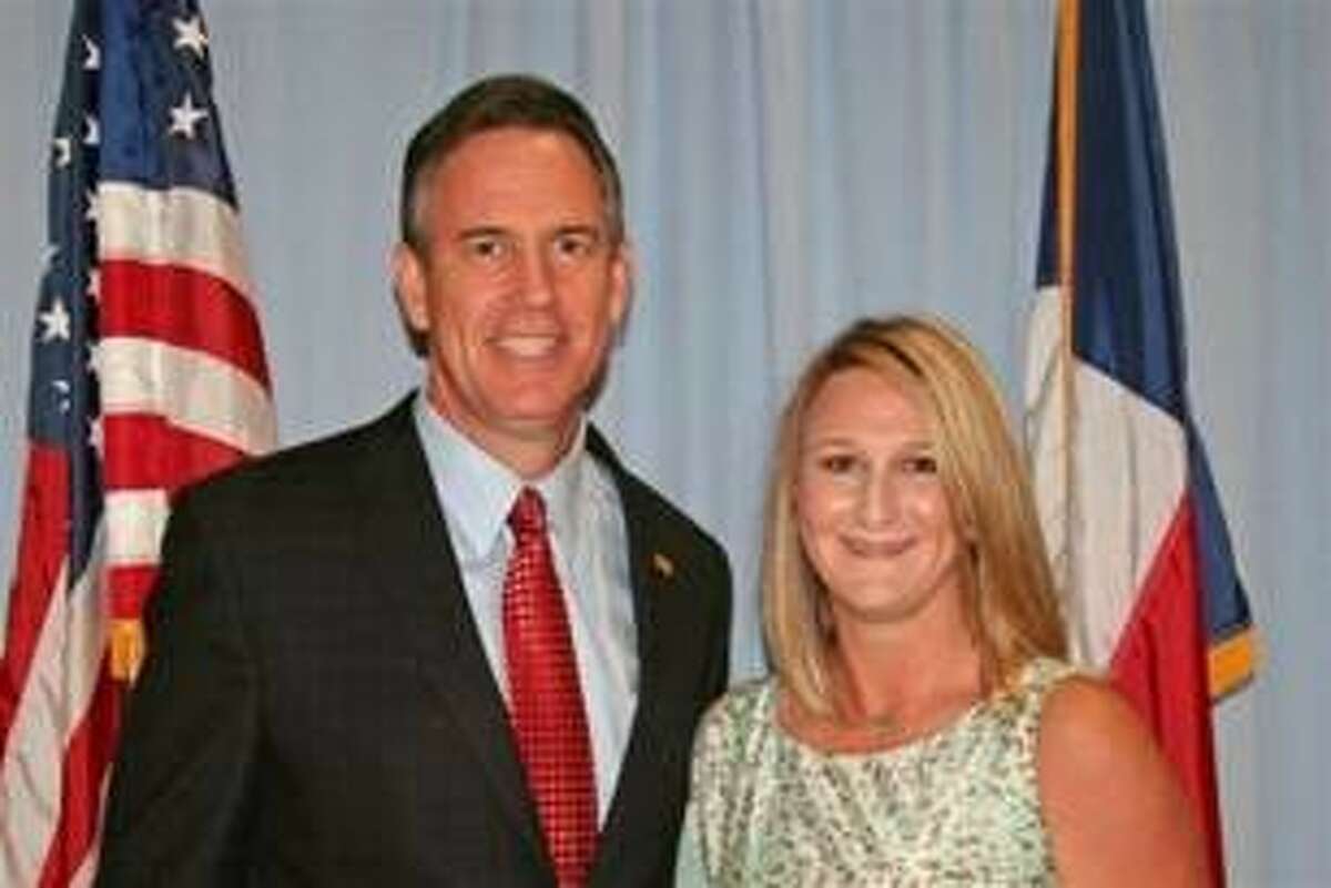 Former Oak Ridge High School ag science teacher Kelly Sullivan poses with CISD Superintendent of Schools Don Stockton in 2012 after receiving the Texas State Teachers Association “Secondary Teacher of the Year” award. Sullivan agreed with county prosecutors to permanently surrender her state teaching license earlier this week in lieu of avoiding prosecution for misdemeanor animal cruelty.