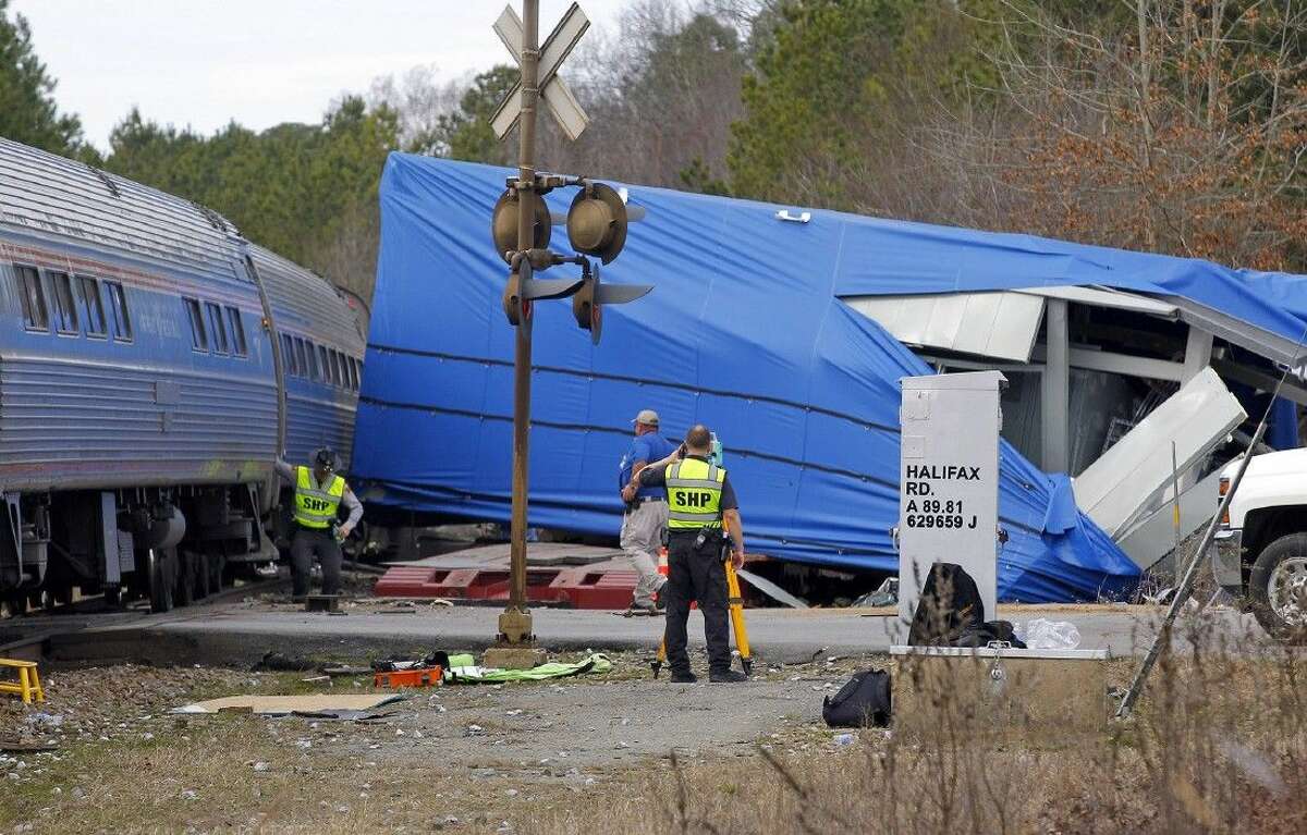 A northbound Amtrak train on Monday collided with an oversize truck carrying an electrical building when the truck got stuck on the tracks at the intersection of highways U.S. 301 and N.C. 903 in Halifax, N.C.