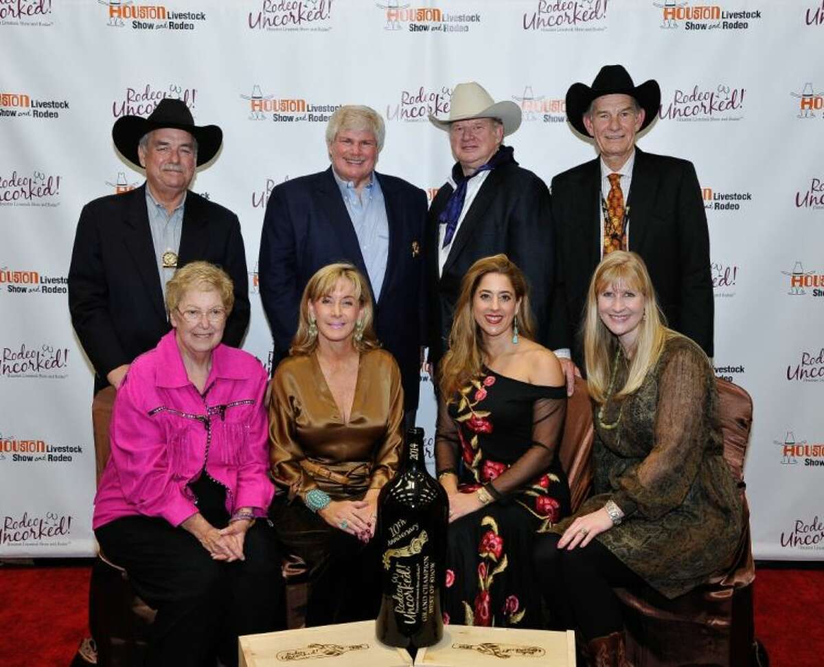 The buyers for the Grand Champion Wine at the 10th Annual Wine Dinner and Charity auction set a record bid of $230,000 for a magnum of wine which benefits charity functions of the Houston Livestock Show and Rodeo.
