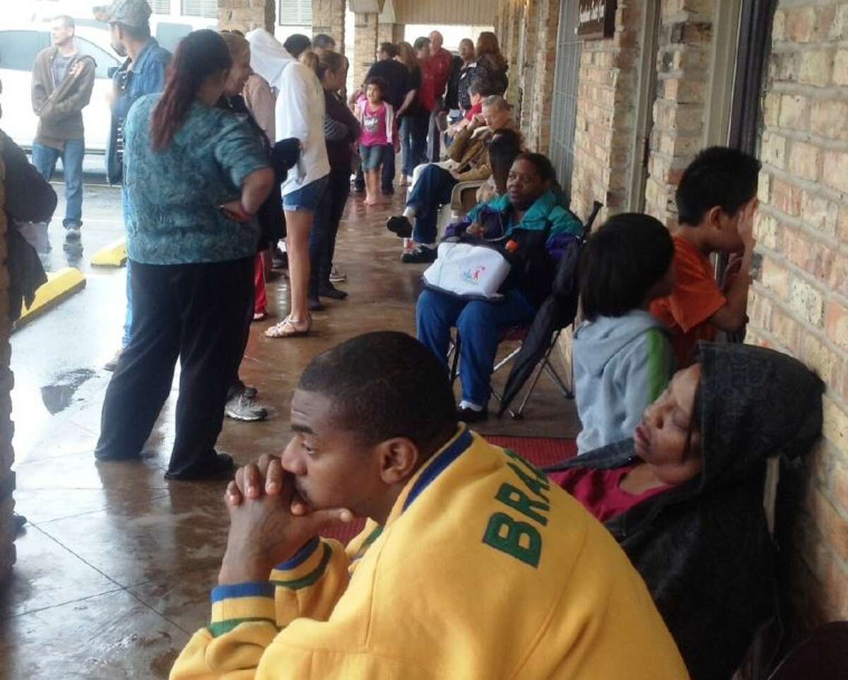 Montgomery County residents line up in front of Dr. Tim Gardner’s dental clinic in Conroe for the Sixth Annual Dentistry From the Heart event. Gardner and his team served 87 residents with more than $45,000 worth of dental work.