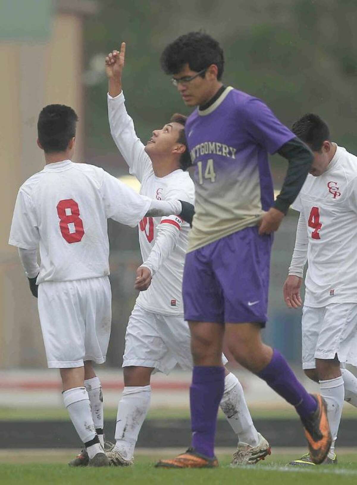 Caney Creek’s Jose Contreras celebrates after scoring the first goal during a District 39-4A match against Montgomery on Wednesday in Grangerland. To view or purchase this photo and others like it, visit HCNpics.com.