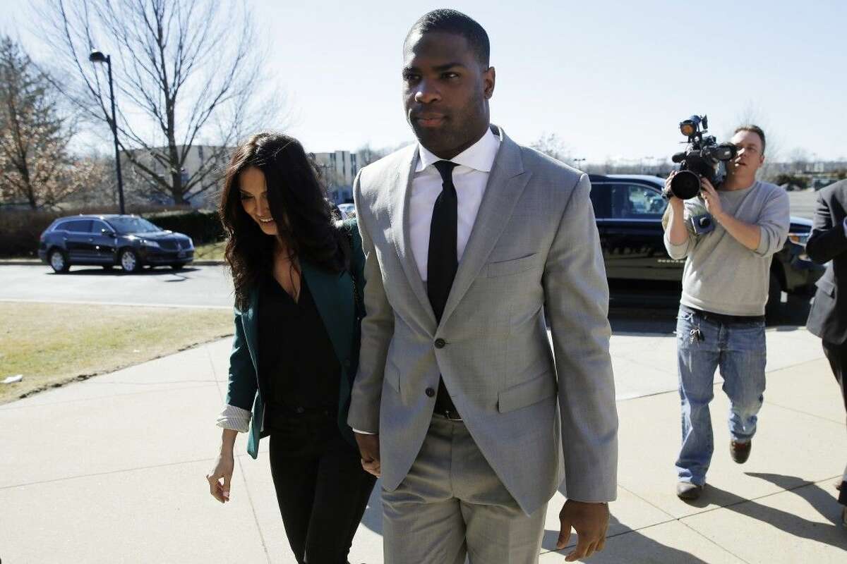 Running back DeMarco Murray arrives with his fiance Heidi Mueller at the Philadelphia Eagles’ NFL football practice facility Thursday in Philadelphia.