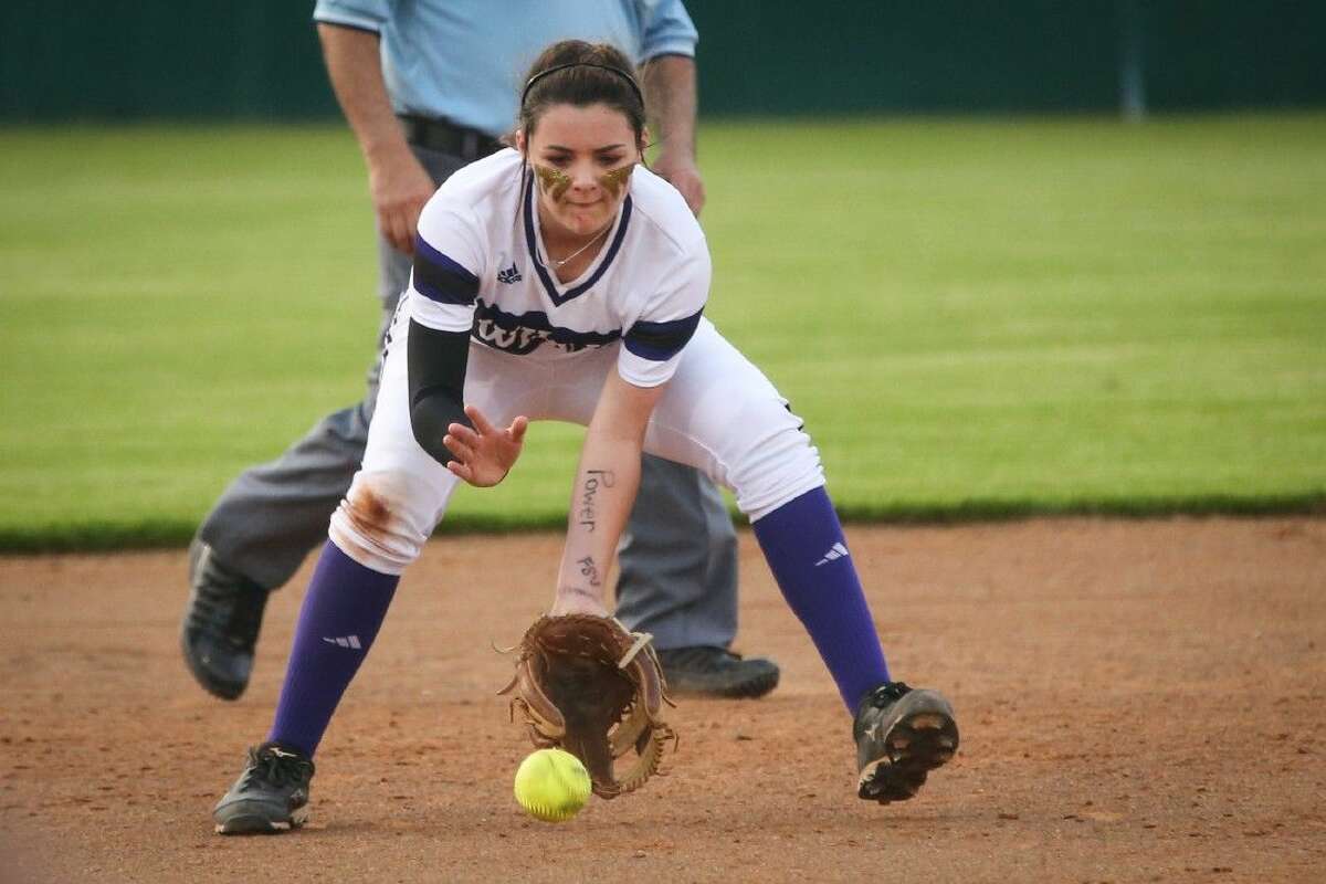 Willis’ McKenzie Parker fields a ground ball during the high school softball game against Bryan on Tuesday at Willis High School.