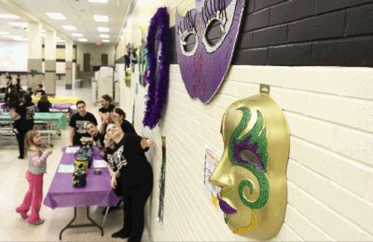 The Conroe High School Golden Girls dance team held its annual pancake fundraiser last week. The team gave this year's event a Mardi Gras flair and raised $14,000.