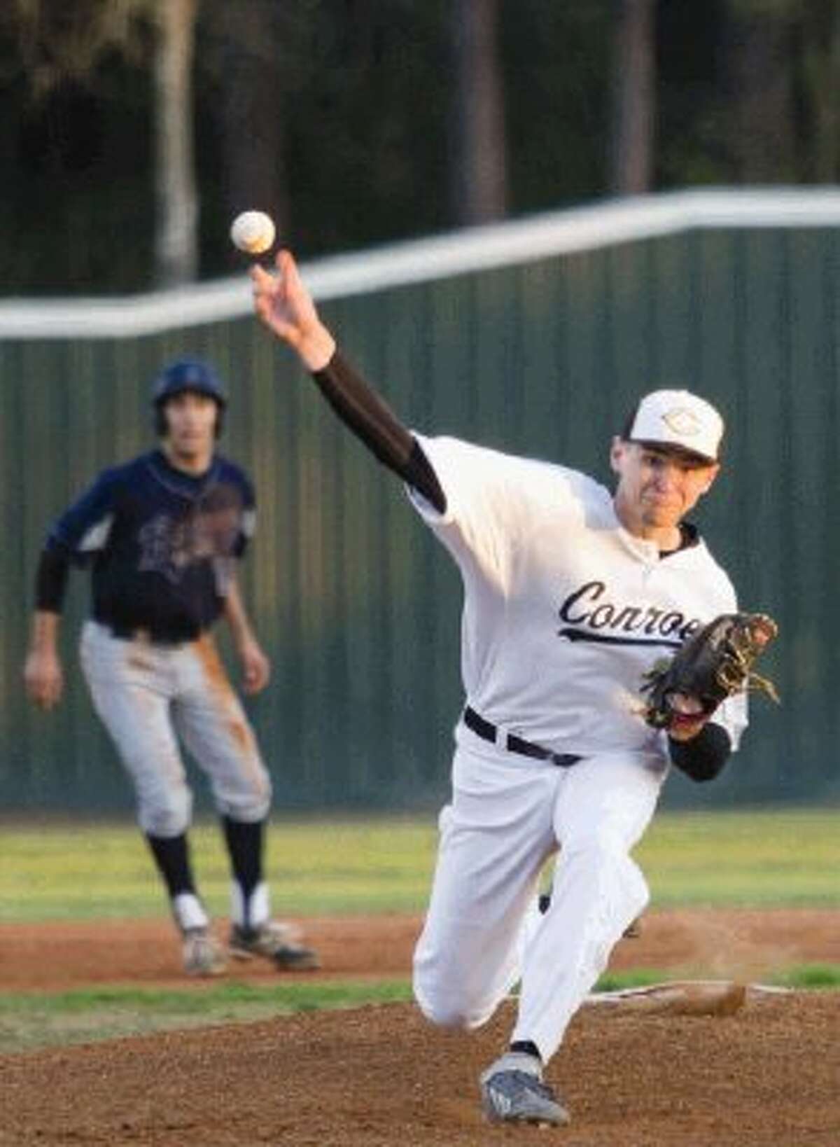 Conroe’s Jordan Fisher pitches against Bryan on Thursday night at Ferrell Park at Elmore Field. To view or purchase this photo and others like it, visit HCNpics.com.