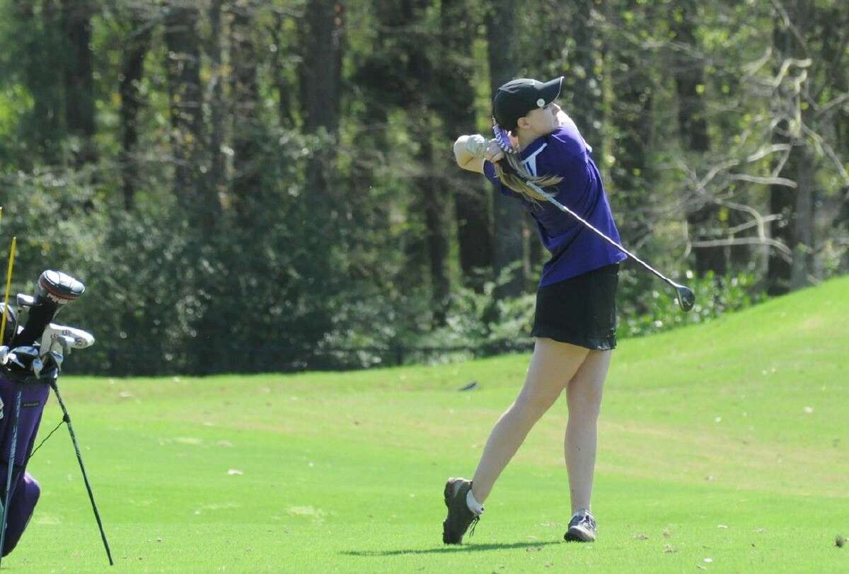 Montgomery’s Tori Wagner fires a shot at the District 15-6A girls golf tournament at Lake Windcrest Golf Club in Magnolia on Tuesday.