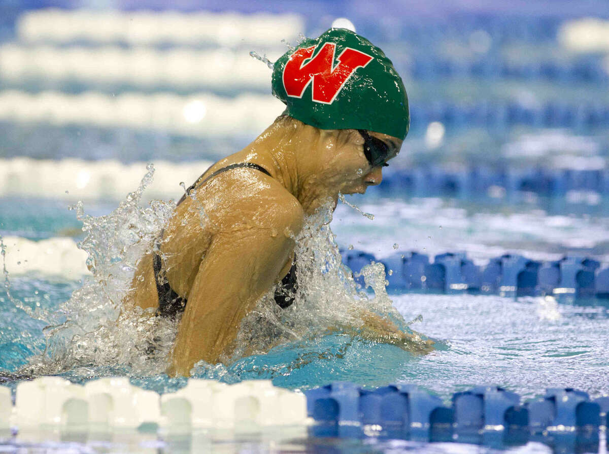 The Woodlands competes in the girls 200-yard medley relay during the Class 6A finals of the UIL State Swimming & Diving Championships at the Lee and Joe Jamail Texas Swimming Center Saturday, Feb. 20, 2016. Go to HCNpics.com to view more photos from the state meet.