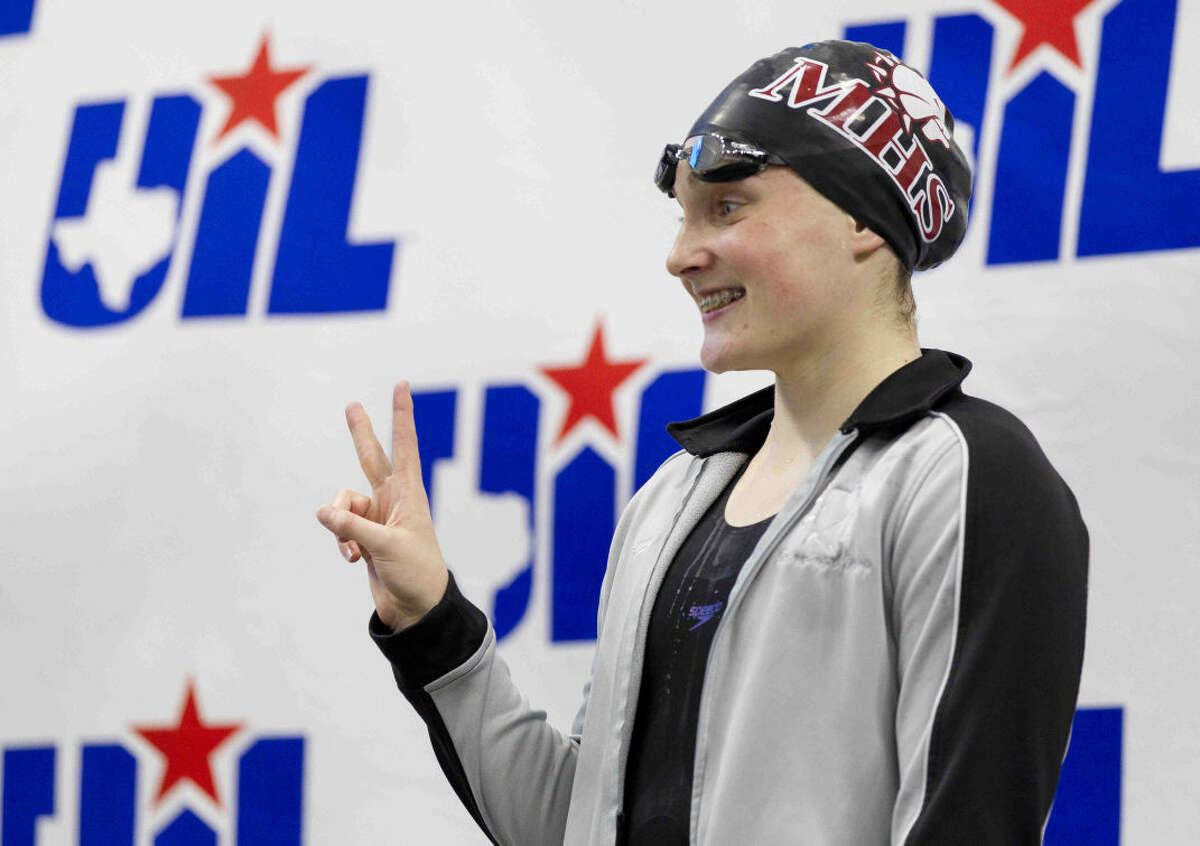 Caitlin Clements of Magnolia celebrates after finishing second in the girls 100-yard freestyle during the Class 5A finals of the UIL State Swimming & Diving Championships at the Lee and Joe Jamail Texas Swimming Center Saturday, Feb. 20, 2016. Go to HCNpics.com to view more photos from the state meet.