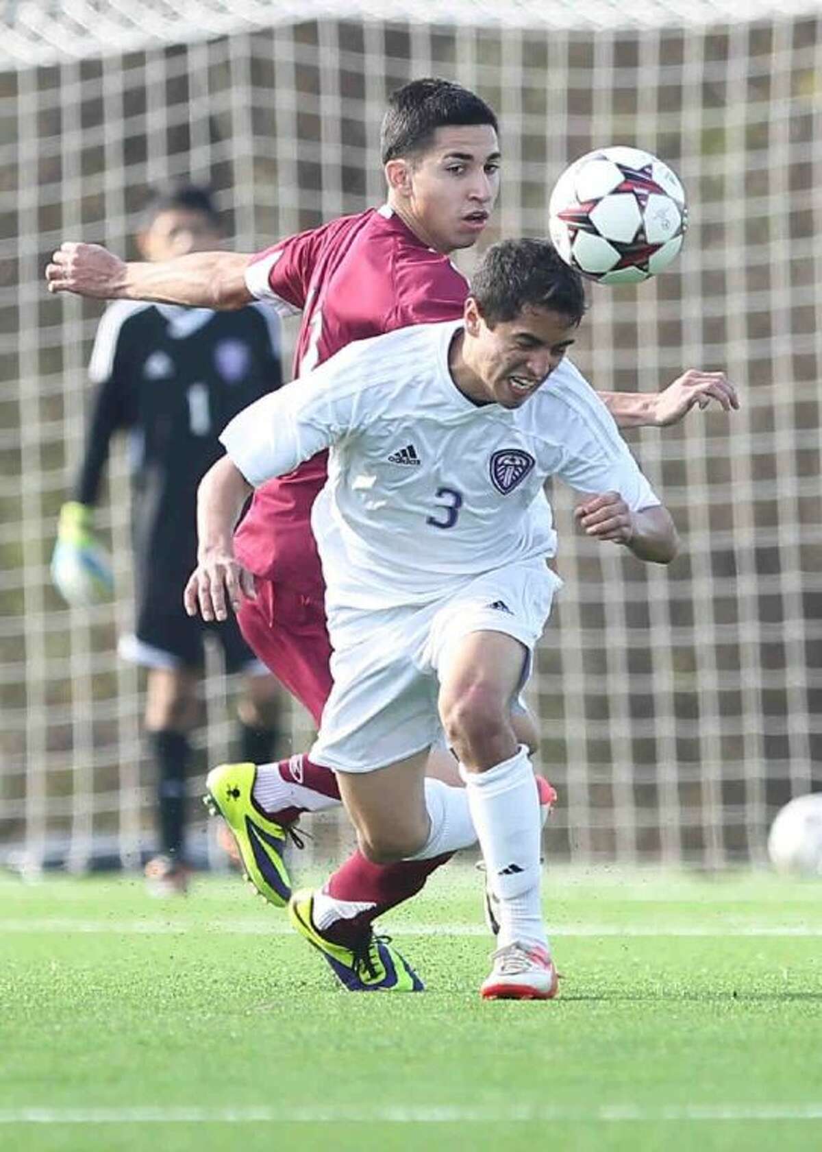 Willis defender AJ Corona heads the ball during a match against Baytown Lee early this season.