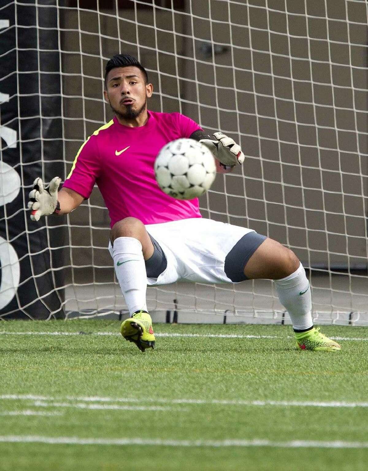 Conroe goalie Juan Ochoa stops a shot during a Region II-6A bi-district playoff game Thursday. Klein Forest defeated Conroe 3-0. To view or purchase this photo and others like it, visit HCNpics.com.
