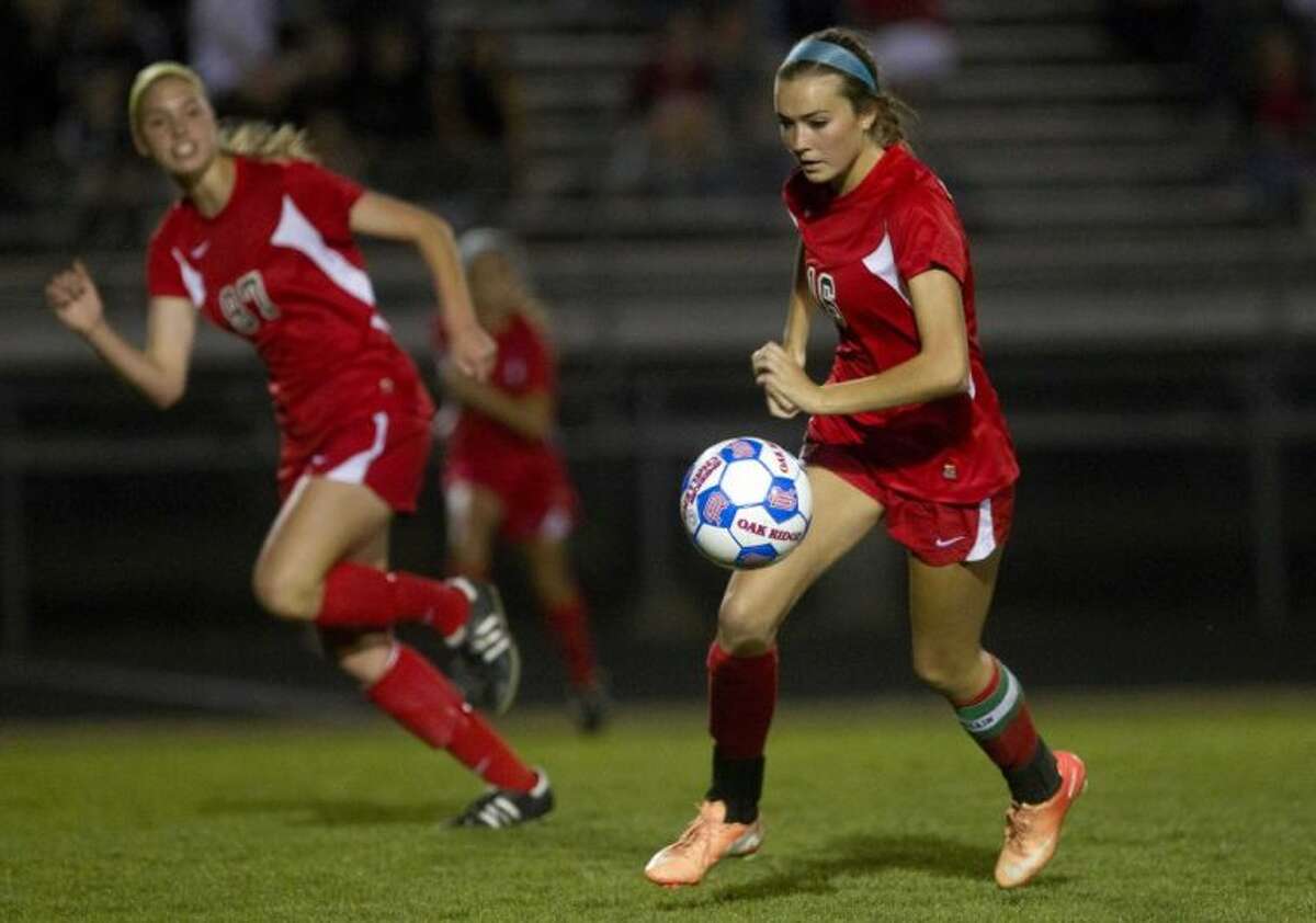 The Woodlands defender Sabrina Marx controls the ball during a District 14-5A match against Oak Ridge on Friday night at Oak Ridge High School. To view or purchase this photo and others like it, visit HCNpics.com.