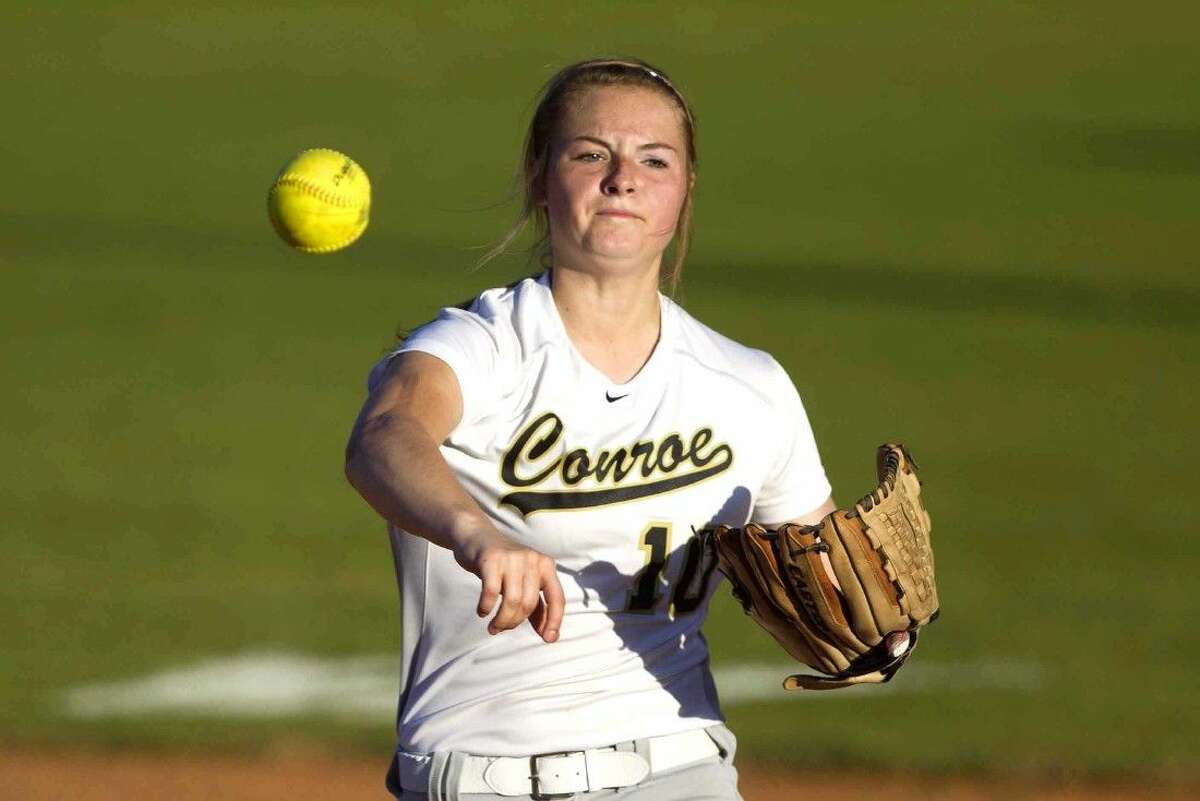 Conroe second baseman Makenna Evans makes a throw to first during a District 16-6A softball game Saturday. To view or purchase this photo and others like it, visit HCNpics.com.