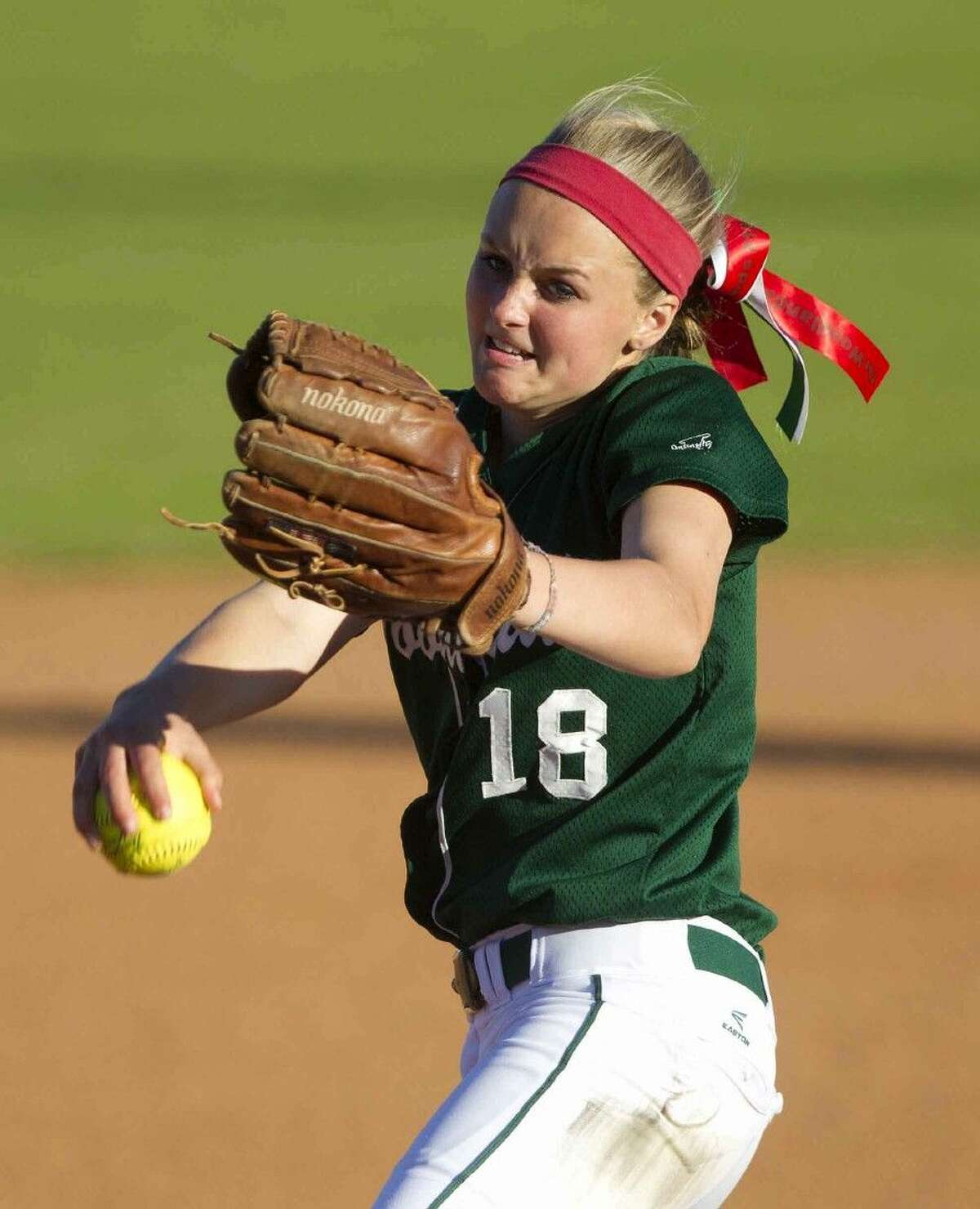 The Woodlands pitcher Emily Langkamp throws during a District 16-6A softball game Saturday. To view or purchase this photo and others like it, visit HCNpics.com.