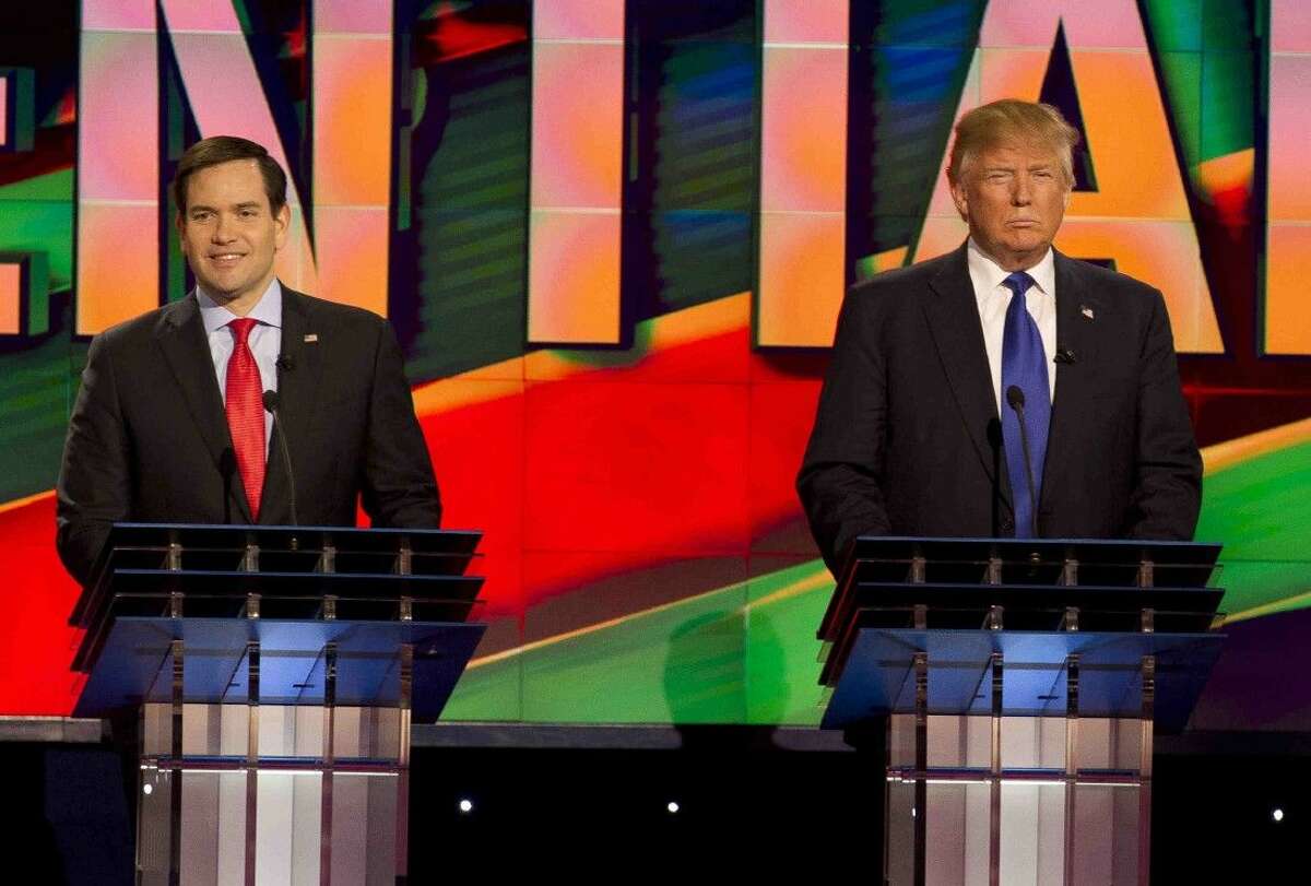 Republican presidential candidates Marco Rubio and Donald Trump are seen Thursday in Houston.
