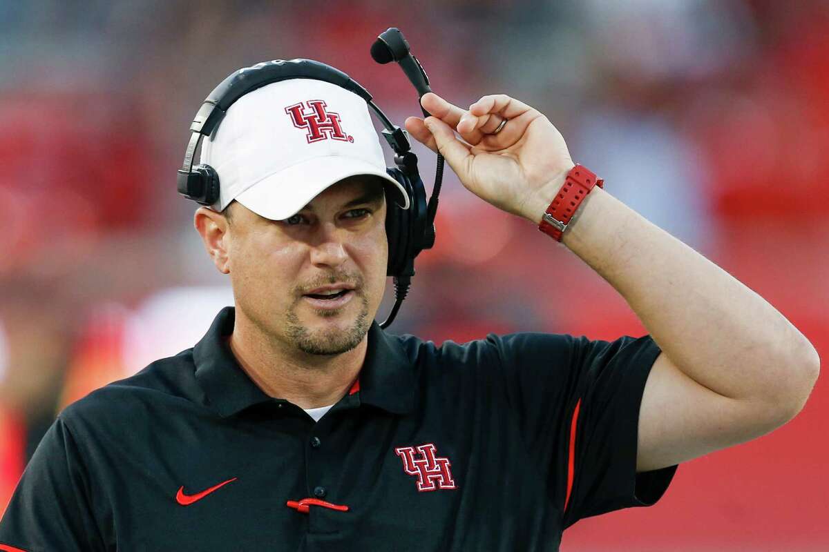 Houston head coach Tom Herman walks up the sidelines during the first quarter of an NCAA football game against Connecticut at TDECU Stadium on Thursday, Sept. 29, 2016, in Houston.