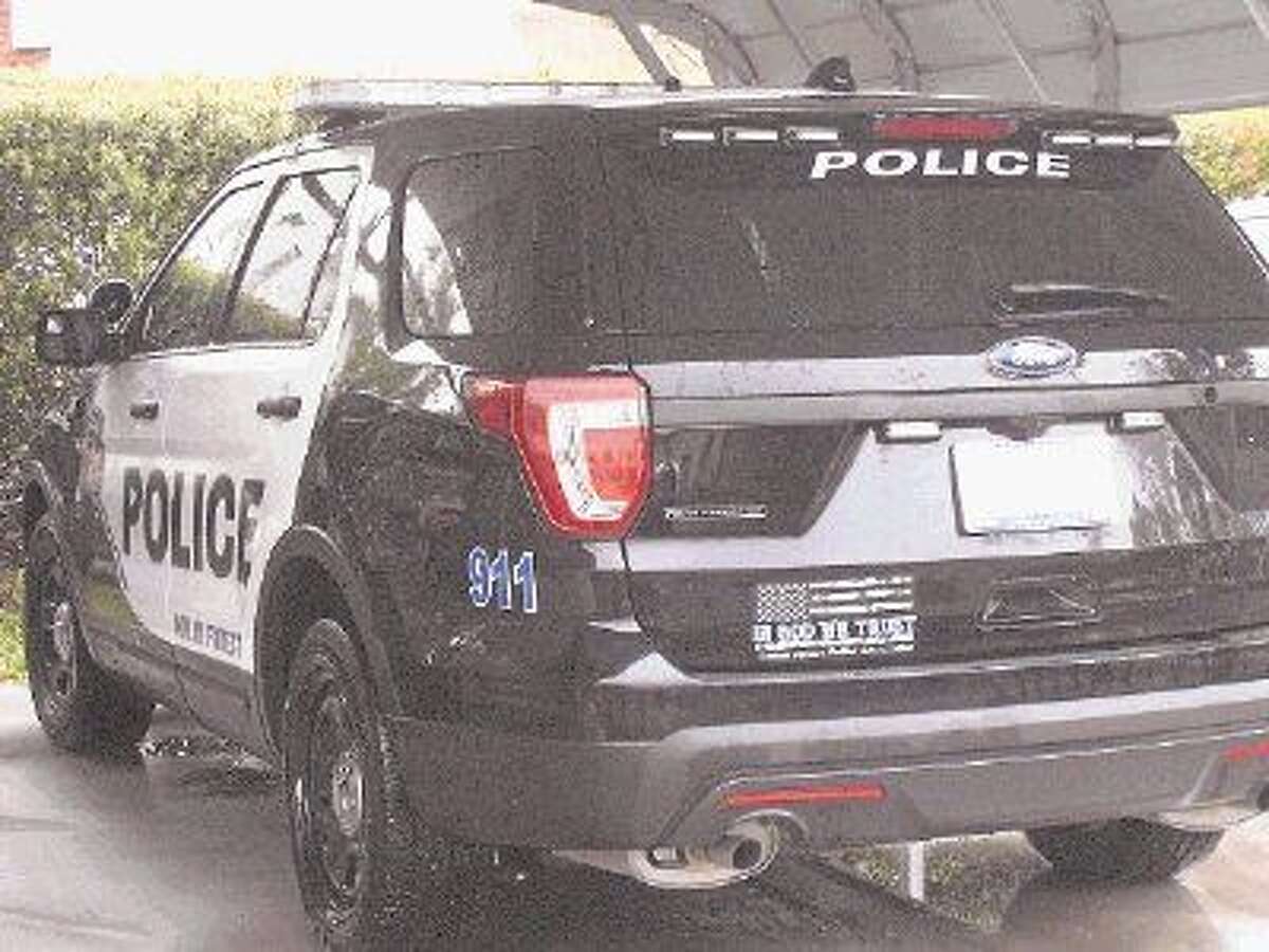 Roman Forest Police Department places decals on vehicles