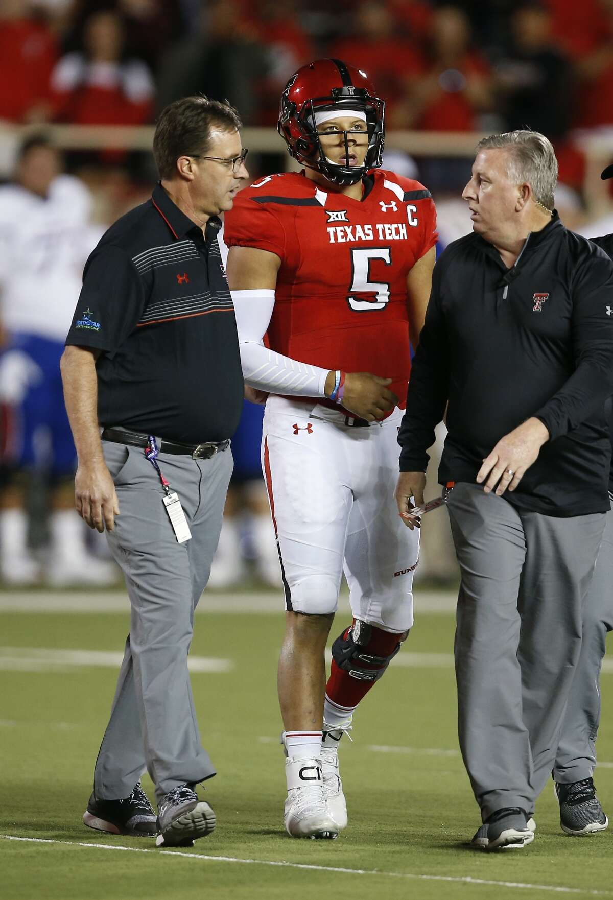 Texas Tech's Patrick Mahomes walks off the field after suffering an injury during an NCAA college football game against Kansas, Thursday, Sept. 29, 2016, in Lubbock, Texas. (Brad Tollefson/Lubbock Avalanche-Journal via AP)