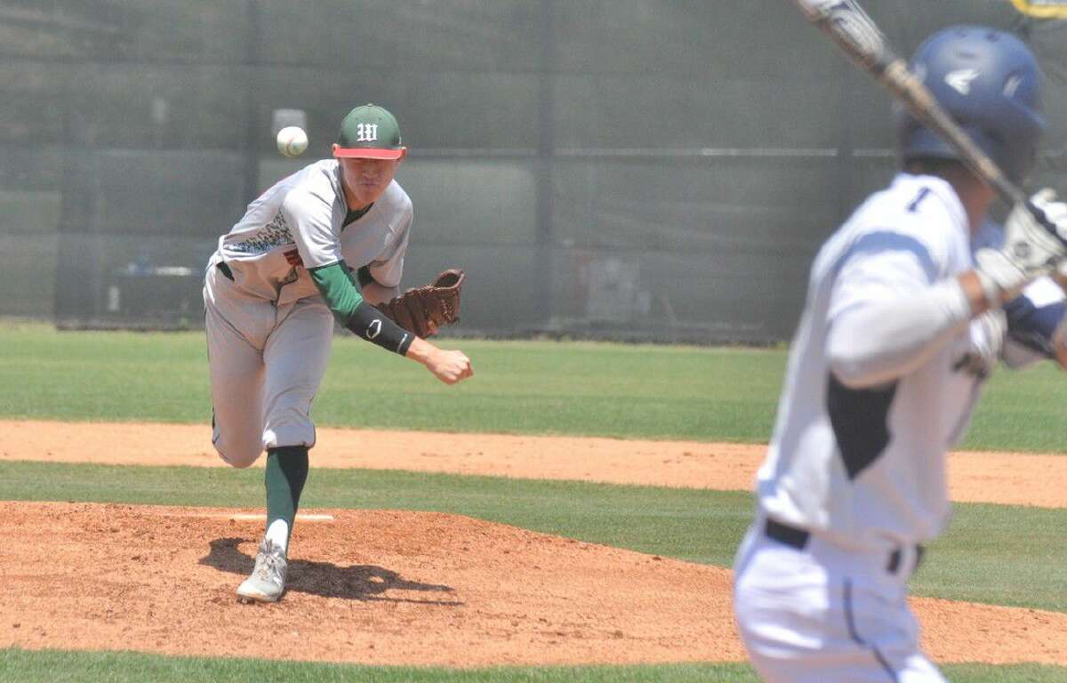 The Woodlands' Devin Fontenot delivers a pitch against Klein Collins in Game 2 of a bi-district playoff series at College Park High School on Saturday.