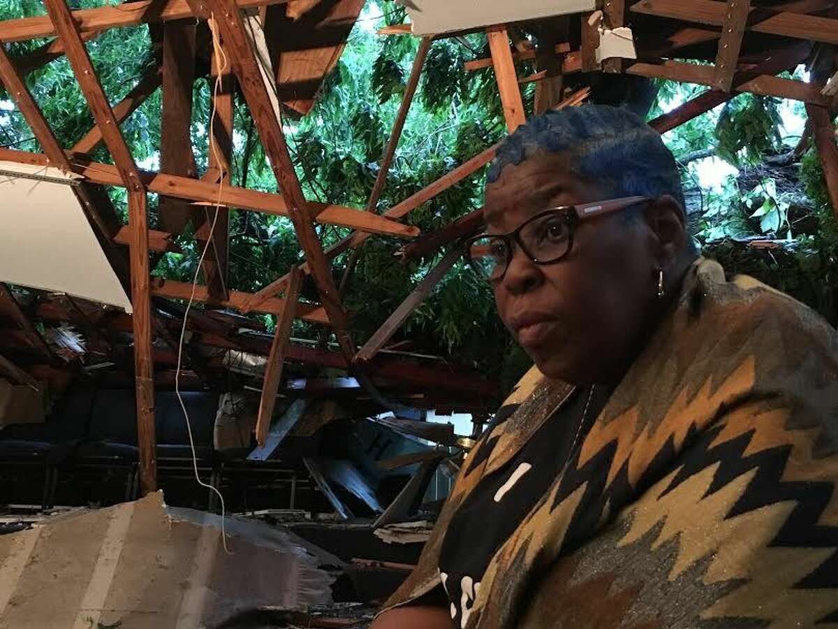 Conroe resident and member Danda Crawford described the experience as “very emotional” after a Pecan tree crashed throguh Hopewell Church located at 504 Ave F in Conroe on Thursday night.