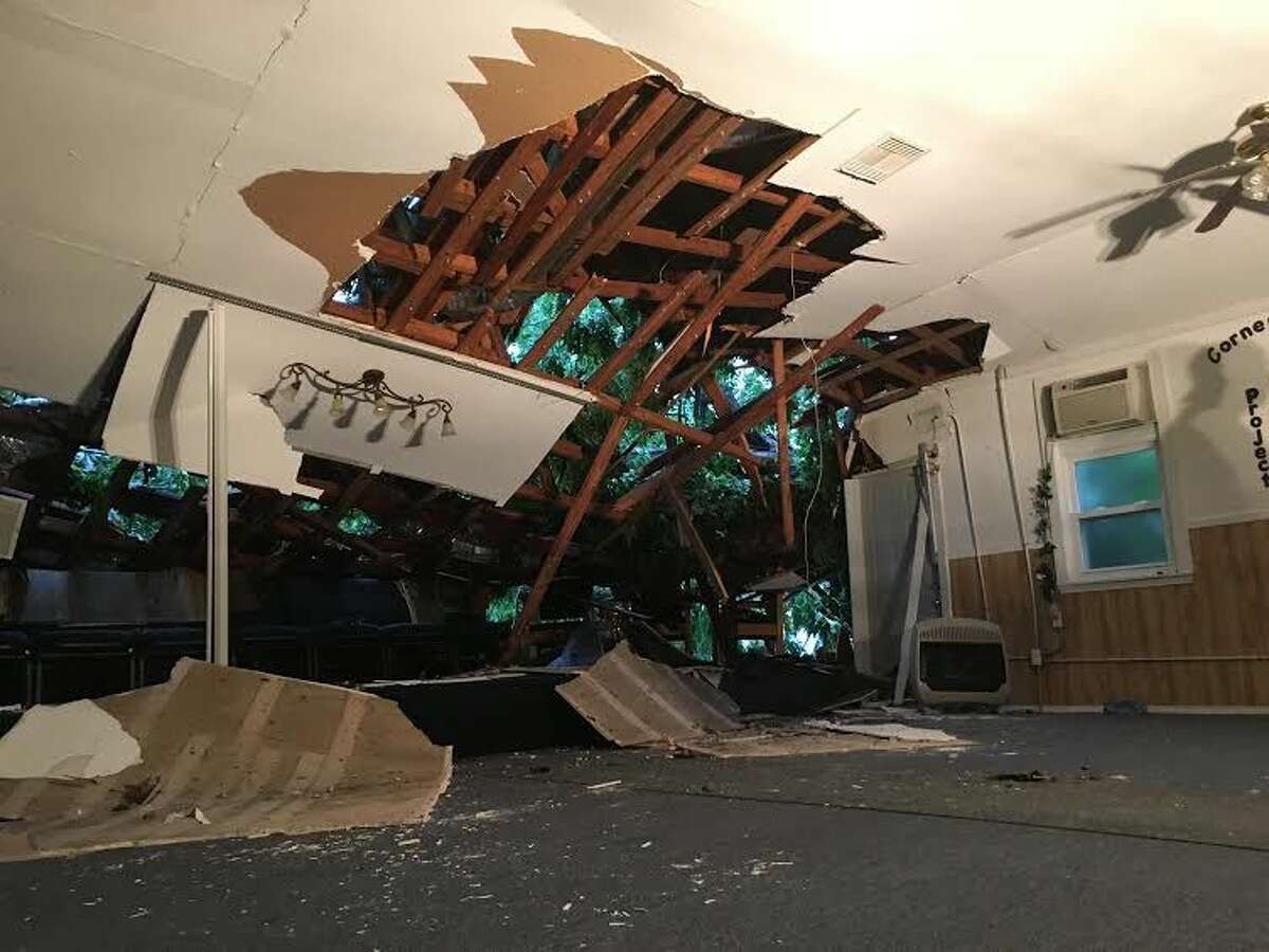 A pecan tree crashed throguh Hopewell Church located at 504 Ave F in Conroe on Thursday night. Pastor Milton Taylor, who started the church 15 years ago and called it a “total loss”.