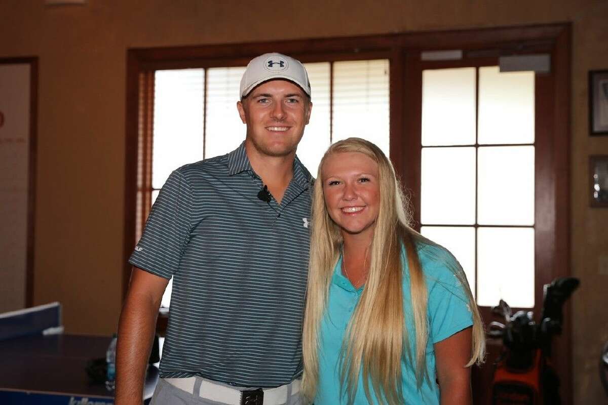 Montgomery’s Hailee Cooper, right, poses with U.S. Open and Masters champion Jordan Spieth, a former Texas Longhorn who grew up in Dallas.