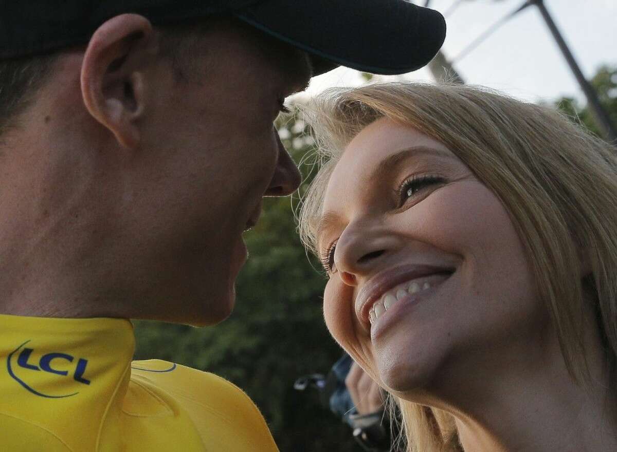Tour de France winner Chris Froome shares the moment with his wife, Michelle.