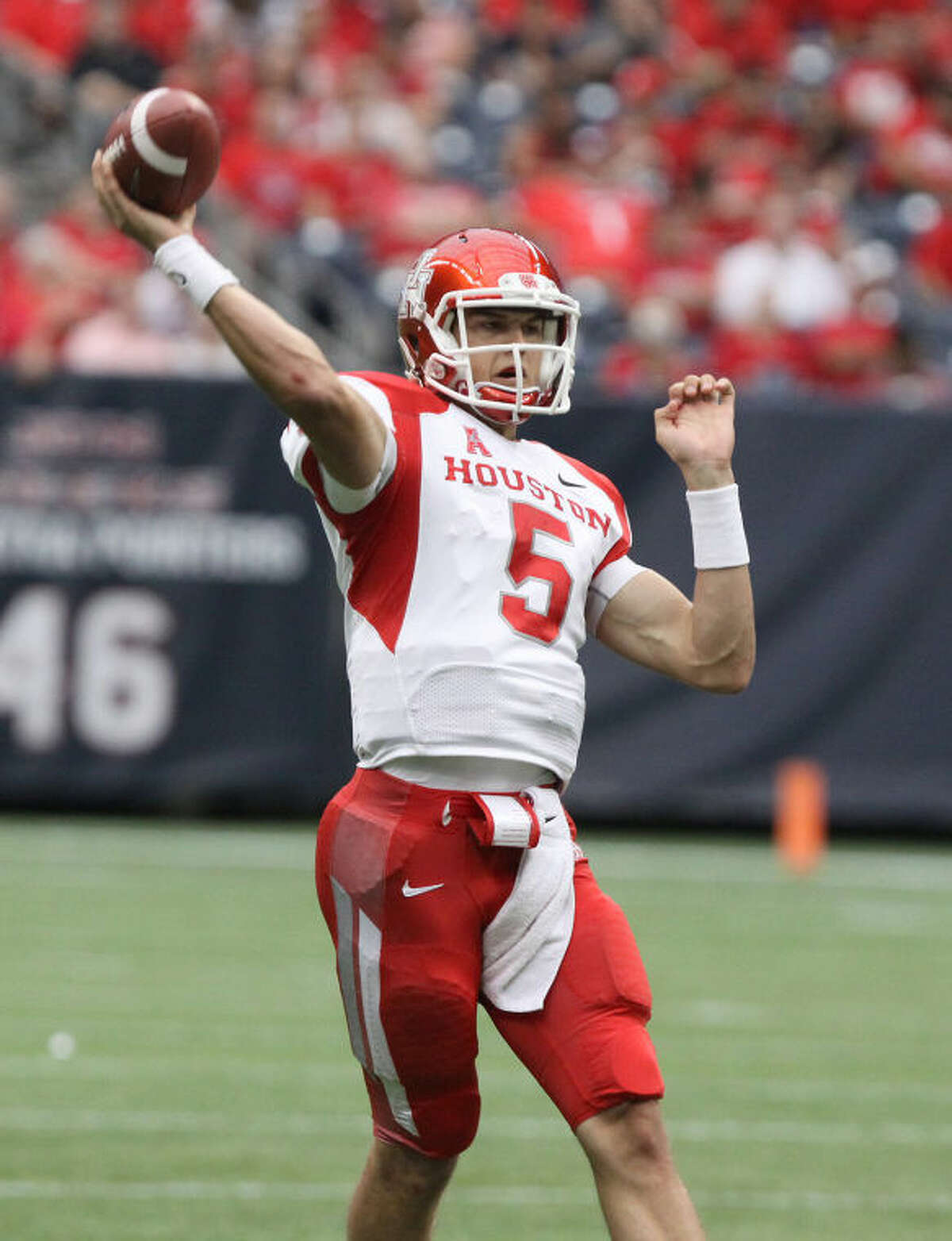 Houston's John O'Korn throws during the Bayou Bucket at Reliant Stadium Sept. 21 in Houston. O'Korn was named AAC Rookie of the Year.
