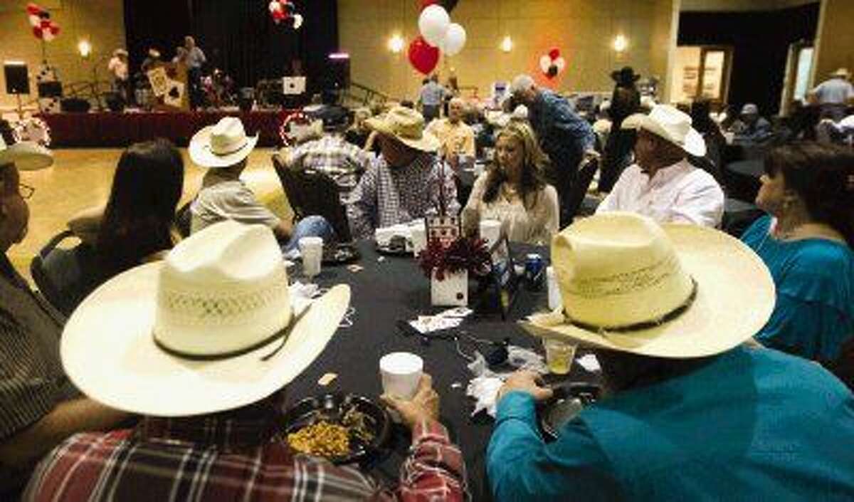 Montgomery County Fair Association members enjoy a night of food and games during the annual appreciation dinner Saturday.
