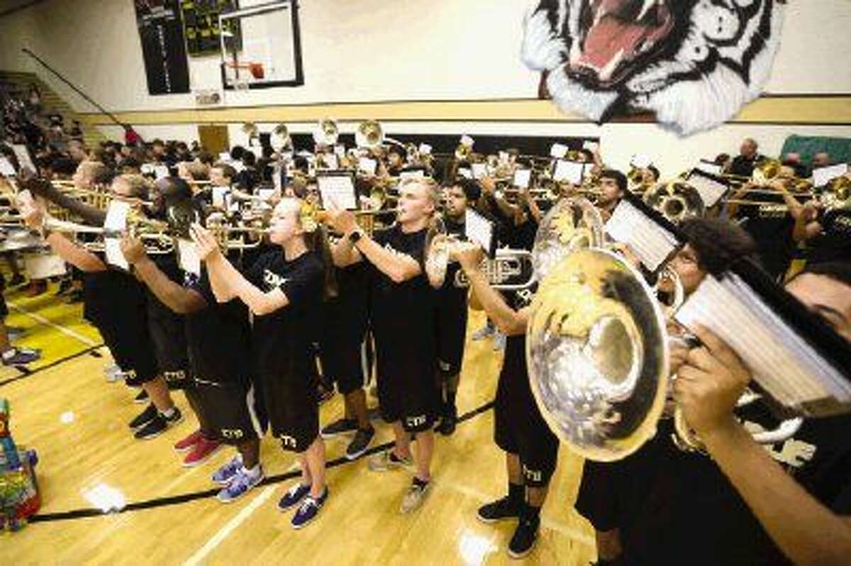 The Conroe Tiger Band performs during the ‘Meet the Tigers’ at The Pit on Monday night. Conroe’s football team opens the season Friday night against Aldine Nimitz.