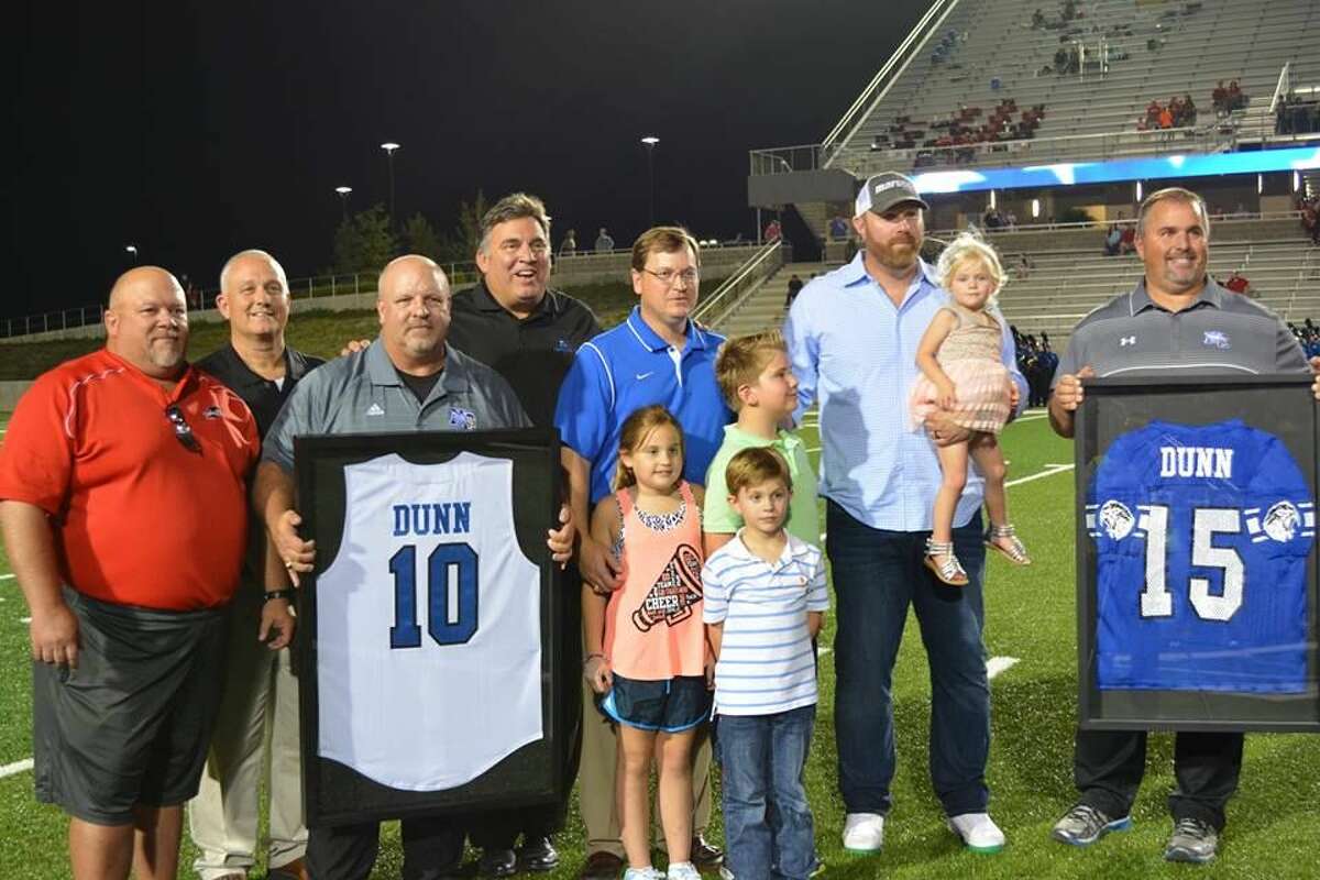 Former New Caney Eagle Adam Dunn gets his football and baseball numbers retired on Friday, Aug. 28, during the New Caney vs. Diboll game.