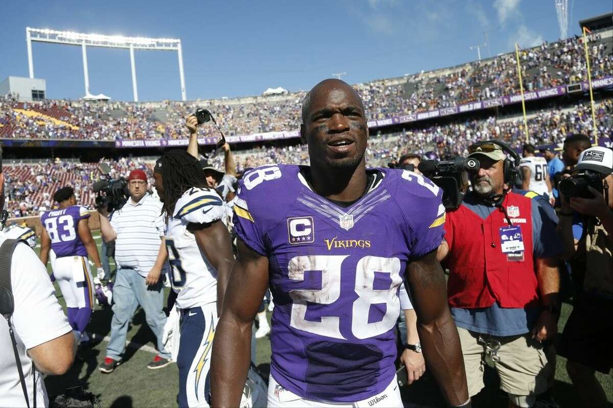 Minnesota Vikings running back Adrian Peterson (28) takes part in