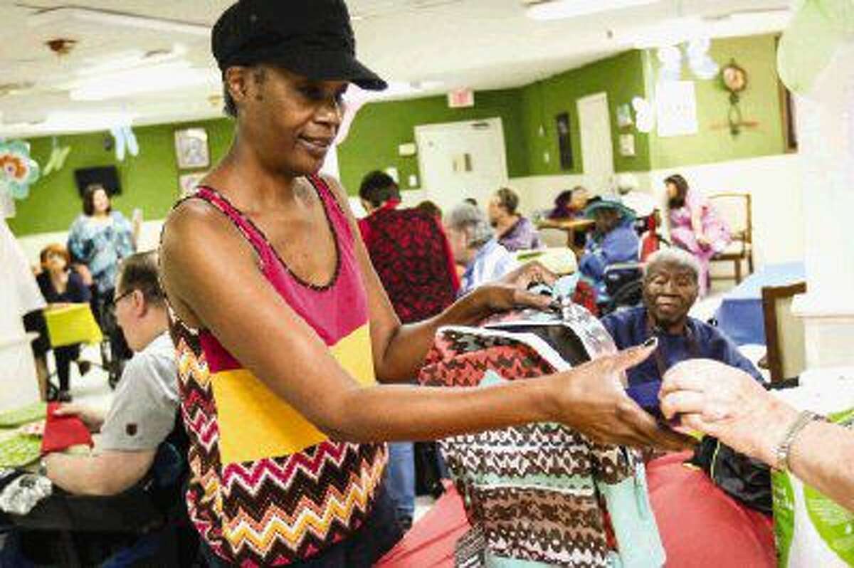 Willis nursing home residents buy backpacks for students