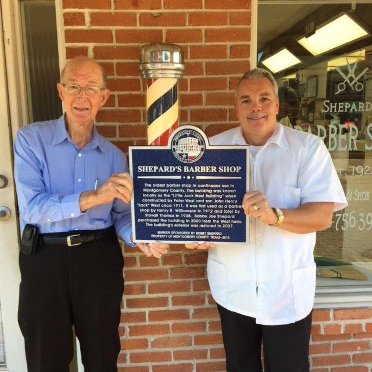 Pictured are Bob Shepard, left, and Leon Apostolo, right. The Montgomery County Commissioners Court and the County Historical Commission will be dedicating the county's first Montgomery County Historical Marker on Tuesday, Oct. 13, at 8:30 a.m. at Shepard’s Barber Shop at 116 Simonton Street in downtown Conroe (across from the Red Brick Tavern). This old building, built in 1911 and then known as the "Little Jack West Building,” has been continuously used as a barber shop since 1912. Apostolo currently owns Shepard’s Barber Shop and Shepard owns the historic building the shop is in.