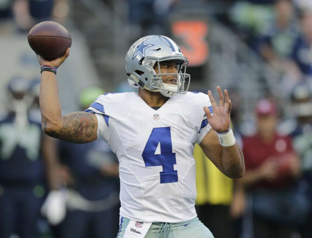 Dallas Cowboys quarterback Tony Romo throws five interceptions in