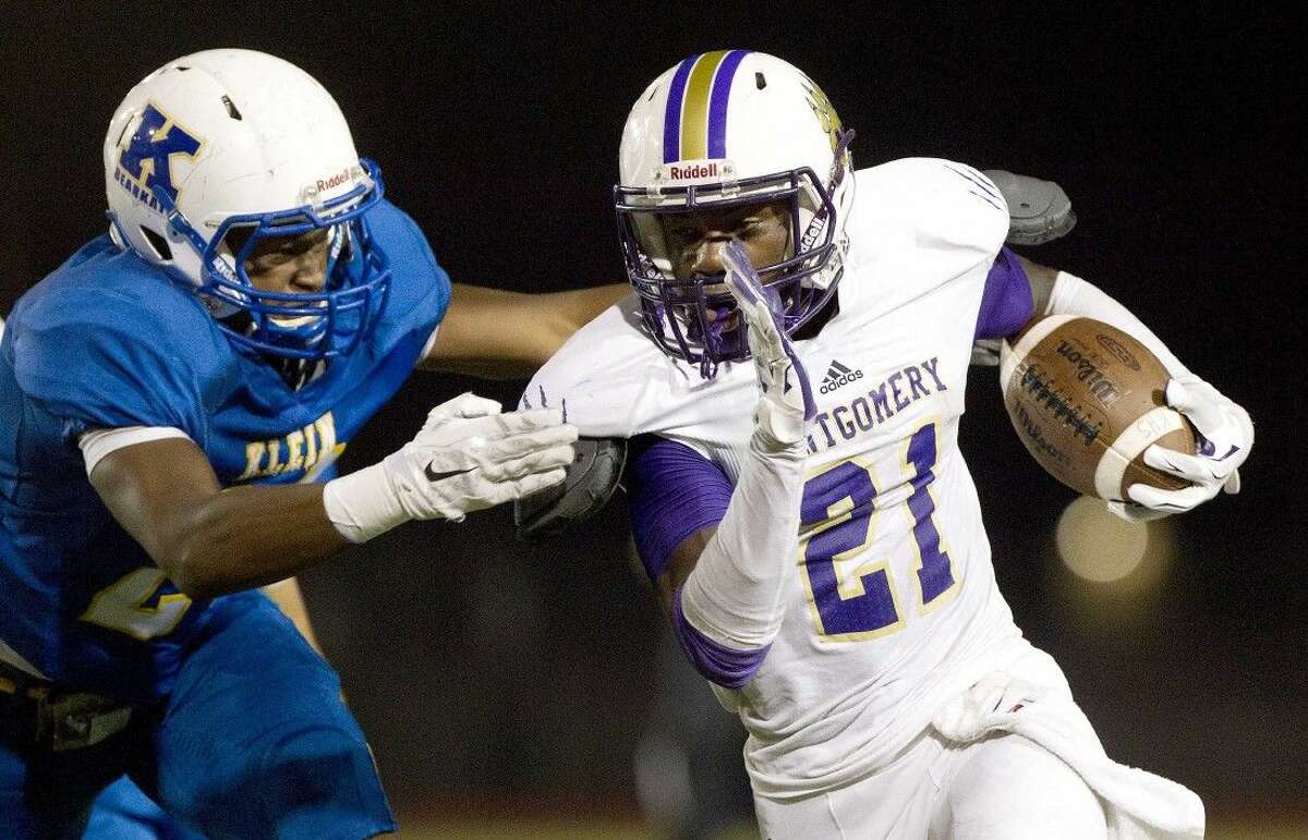 Montgomery defensive back Anthony Thomas, right, was a first-team choice of the Associated Press’ Class 6A all-state football team.