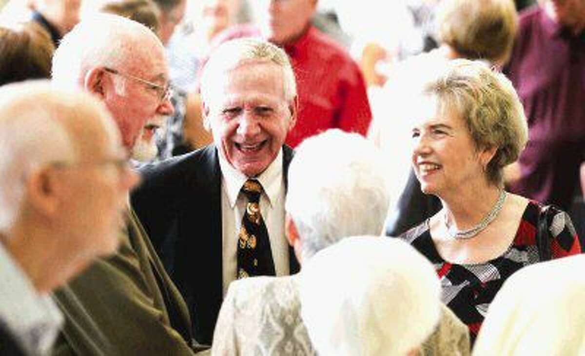 Larry Renetzky, center, visits with Travis Washburn, left, as his wife Carol looks on during a banquet in celebration of First Baptist Church of Conroe’s 125th anniversary Saturday. The church will continue its celebration today with the unveiling of a historical marker at 9:50 a.m. in front of the church. The marker will be the third in Montgomery County. Go to HCNpics.com to view more photos from the banquet.