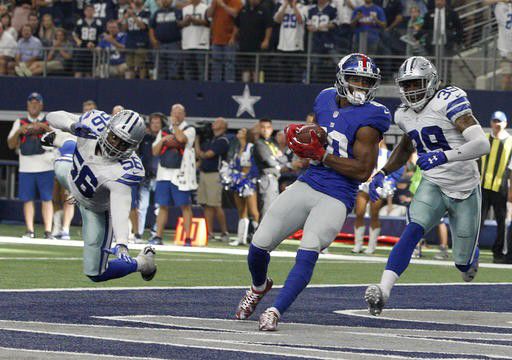 NFL ROUNDUP  Romo, Cowboys charge past Giants