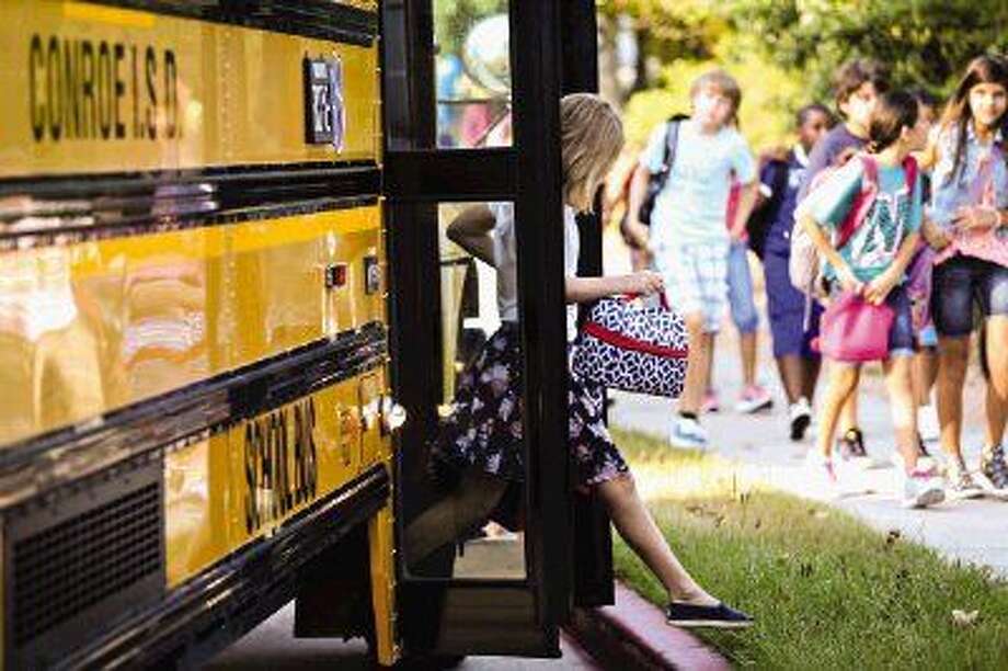 Stewart greets students with a smile at first school in Woodforest community The Courier