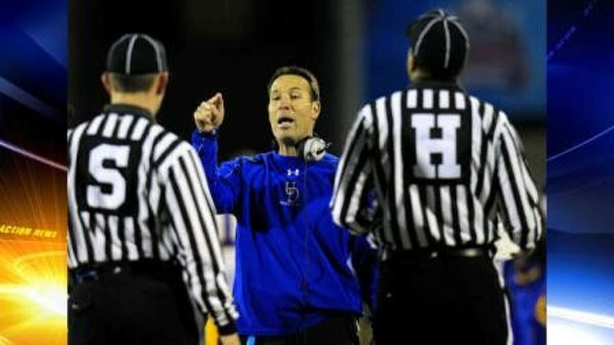 Delaware coach K. C. Keeler makes a point to game officials during the first half of the FCS championship game against Eastern Washington on Jan. 7, 2011, in Frisco. The Eagles scored 20 unanswered points in the second half to win 20-19.