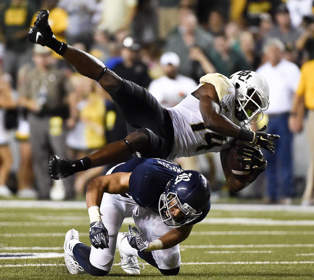 NCAA FOOTBALL: Russell throws 3 TD passes, No. 21 Baylor beats Rice