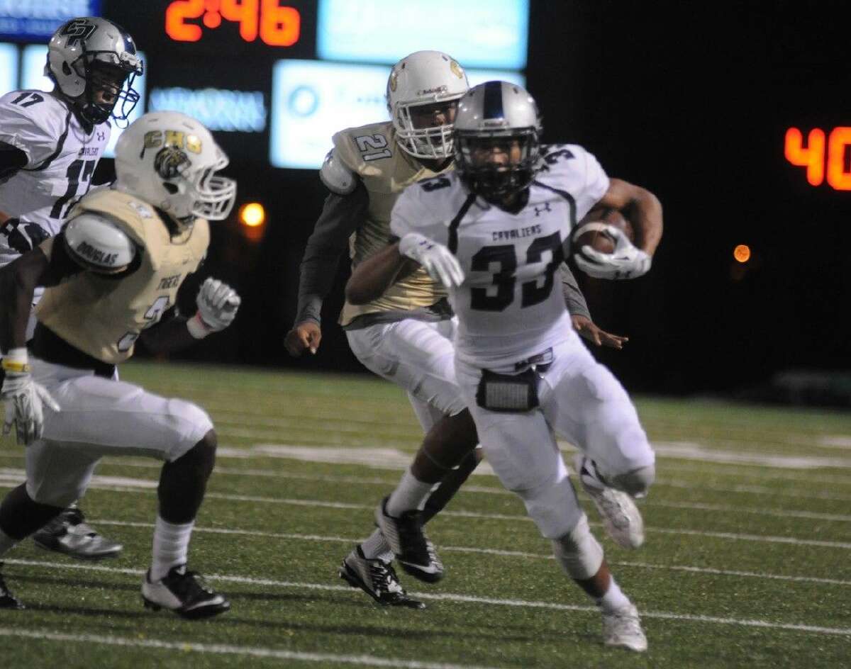 College Park's Diego Garcia finds running room against Conroe on Friday at Moorhead Stadium.