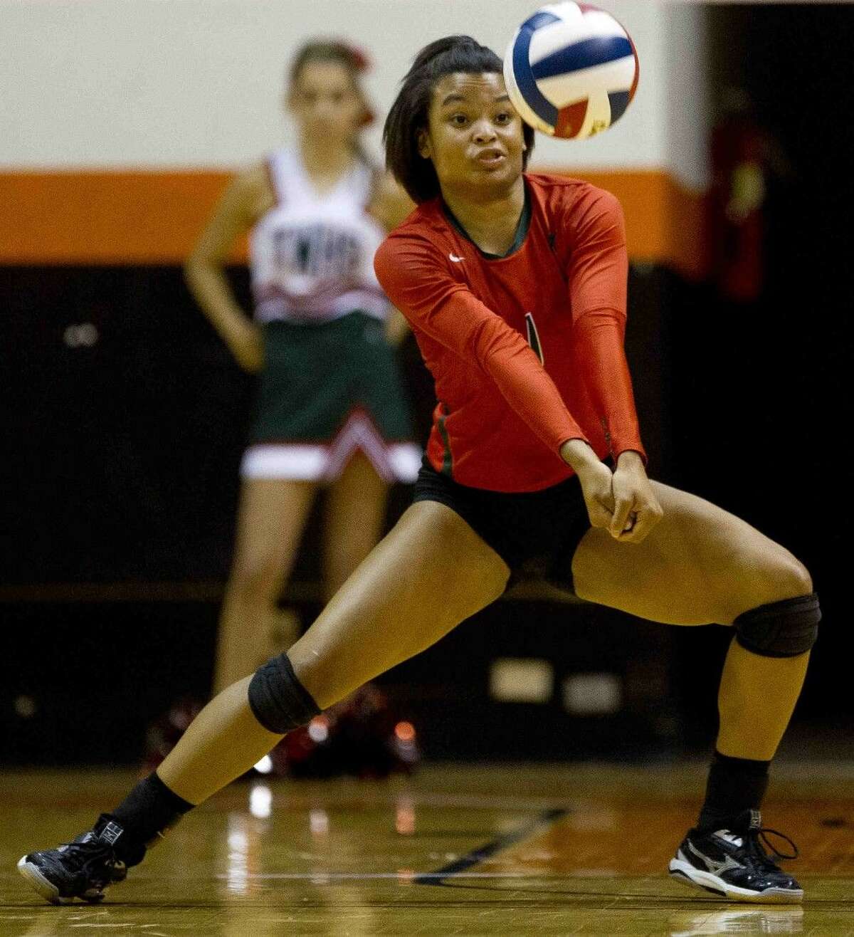 Skylar Scott, The Woodlands, returns a hit during a Region II-6A regional semifinal match Friday, Nov. 13, 2015, in Huntsville. To view or purchase this photo and others like it, visit HCNpics.com.